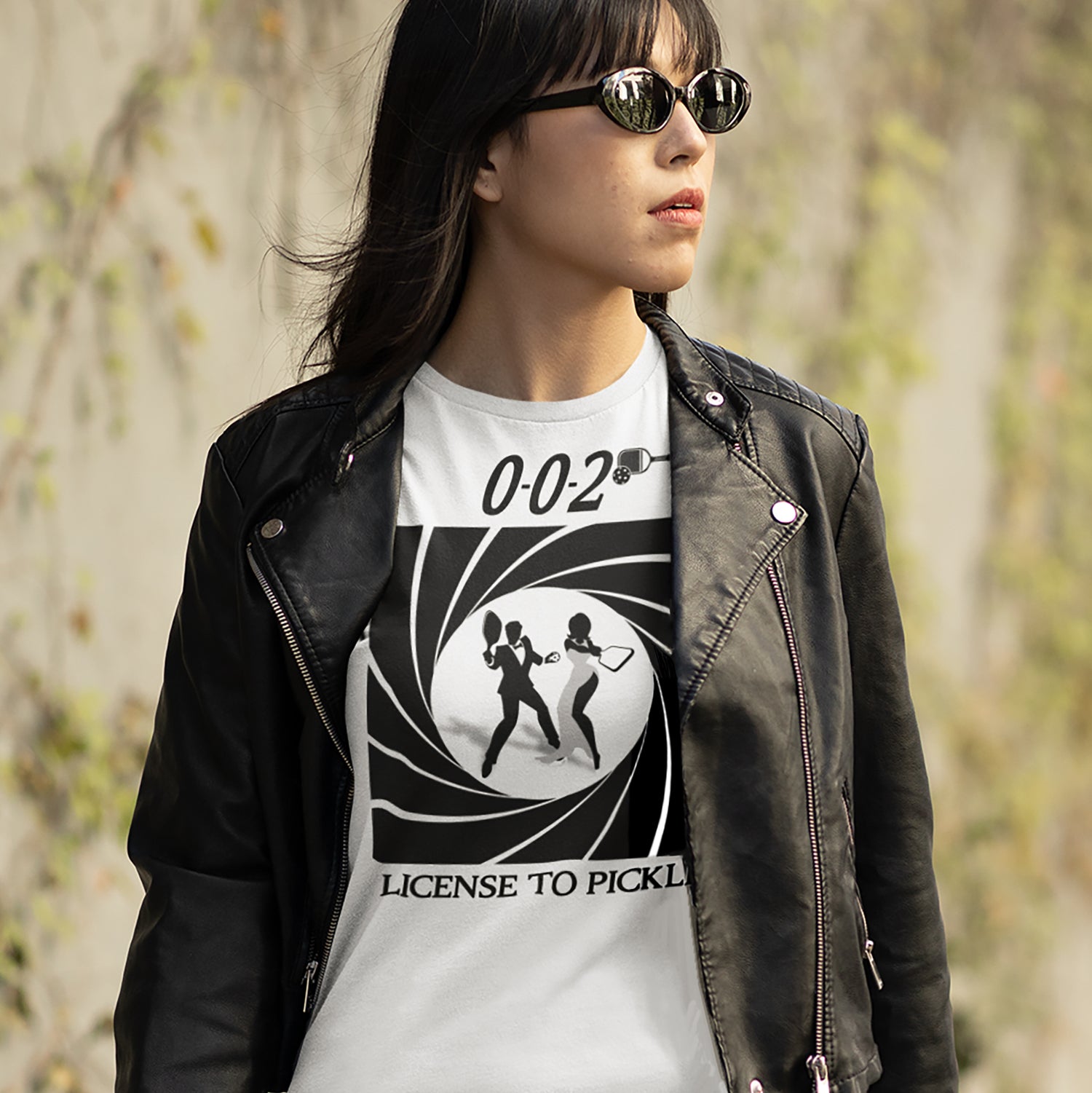 Woman wearing 002 License to Pickle pickleball t-shirt