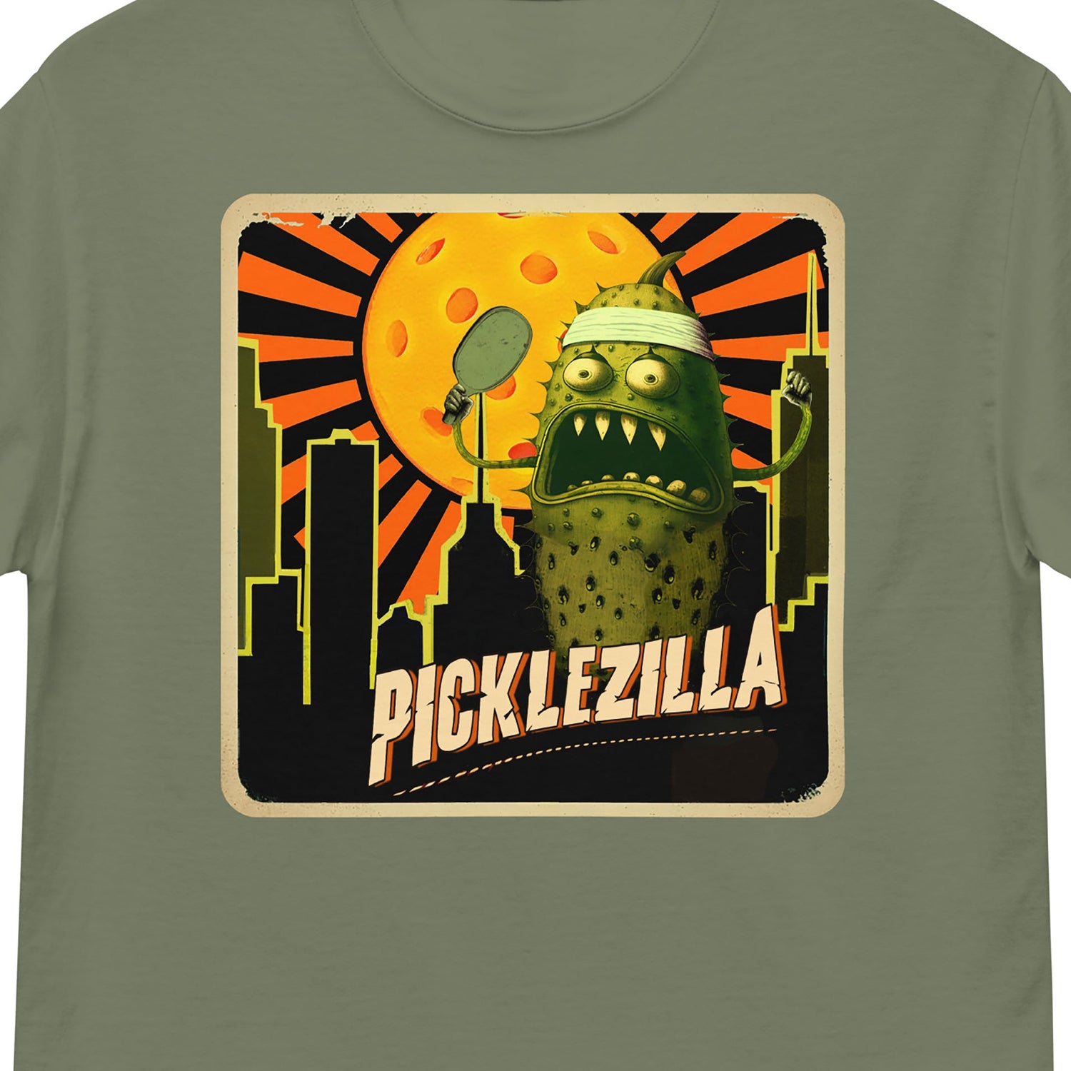 Closeup view of Picklezilla graphic on front of pickleball t-shirt