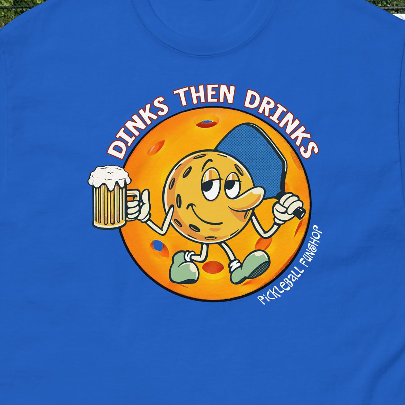 Closeup view of Dinks Then Drinks graphic on front of Men's Royal Blue pickleball t-shirt