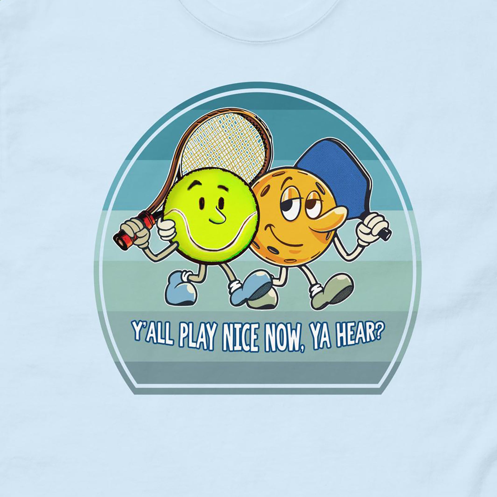 Closeup view of Pickleball and Tennis Play Nice graphic on front of light blue men's t-shirt