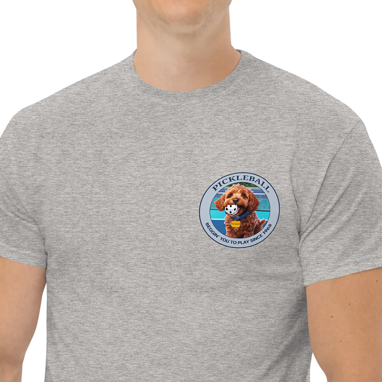 Closeup view of Pickles Beggin graphic on Left Chest of Men's Sport Grey pickleball t-shirt