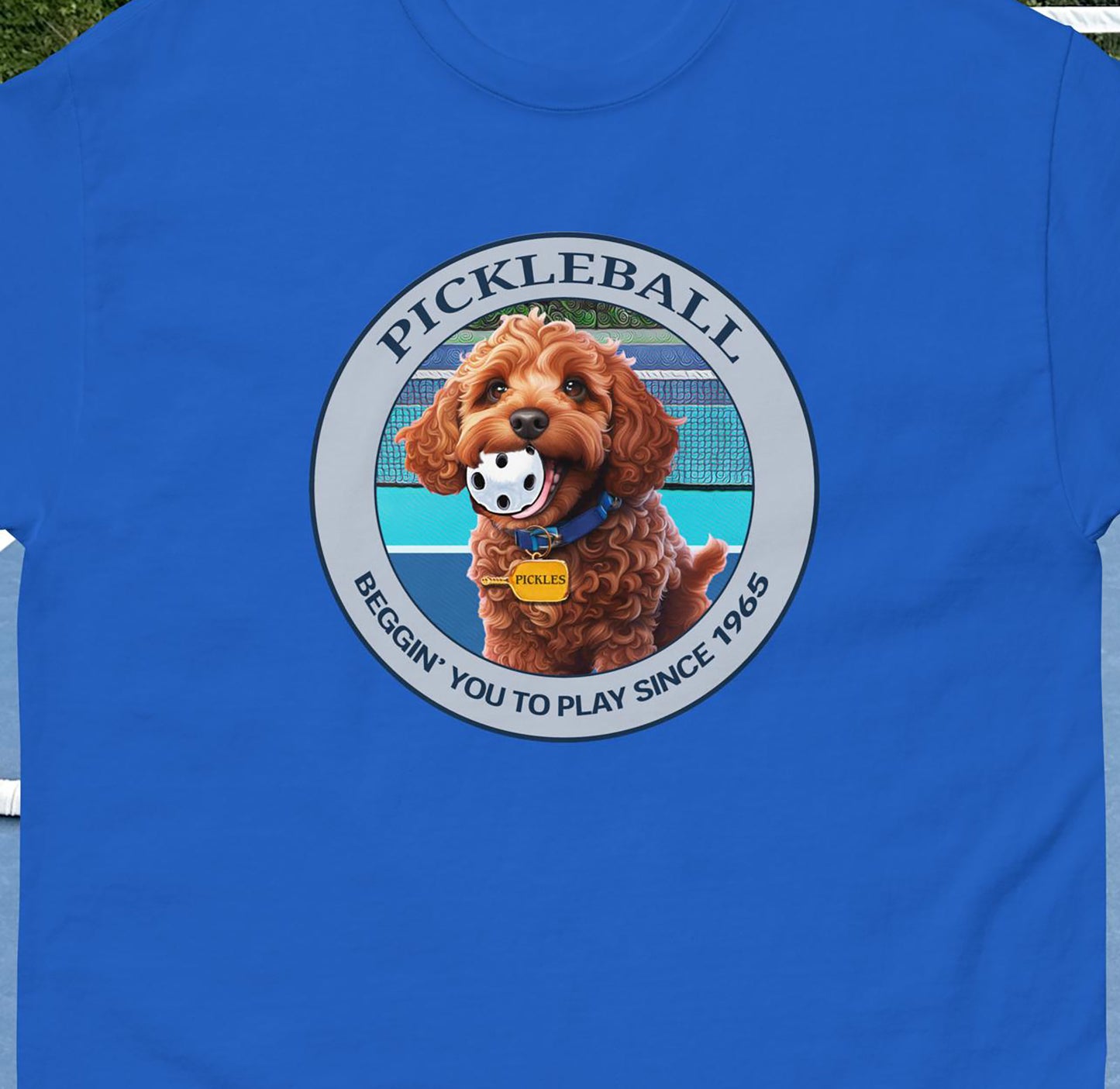 Closeup view of Pickles the Dog Beggin graphic on Front of Men's Royal Blue pickleball t-shirt