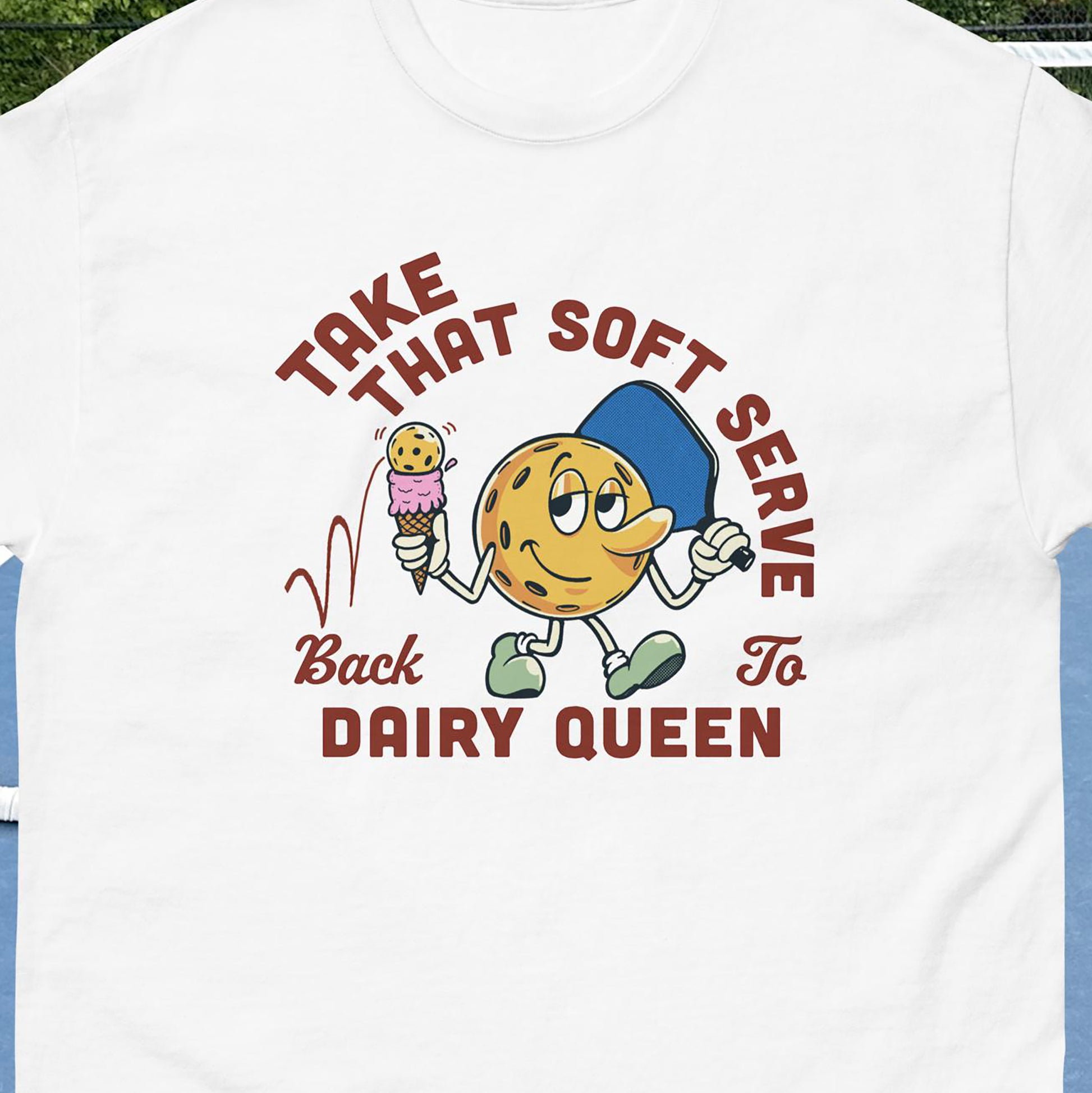 Closeup view of Soft Serve Dairy Queen graphic on front of White Men's pickleball T-shirt